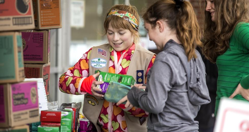 Claire Simon sells Girl Scout cookies