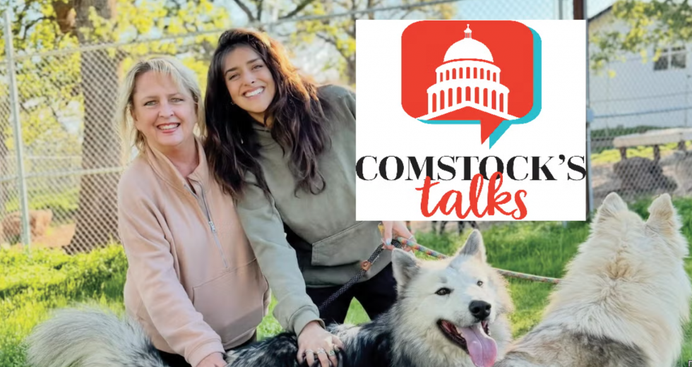 Comstock's Editor Judy Farah and Women for Wolves founder Anjali Ranadivé interact with wolfdogs at the sanctuary Ranadivé opened. (Photo by Gabriel Teague)