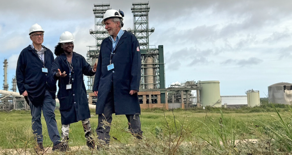 Tom Williams, Olamide Ajala and Kevin Wolf of Wind Harvest visit a field site. (Photo courtesy of Wind Harvest)