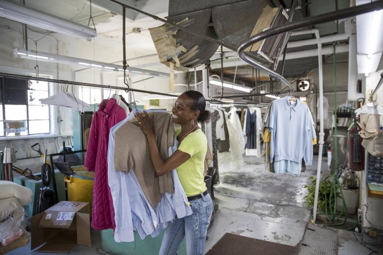 She uses a stain remover to pre-spot stains, such as dirt on the bottom from the dress dragging on the ground, and “sometimes it’s wine — lots of wine.” she says, with a chuckle, before the gown goes into the dry cleaner. Wedding gowns are hung up to air dry for a day and then they are pressed. Phillips estimates they get about five gowns a week.
