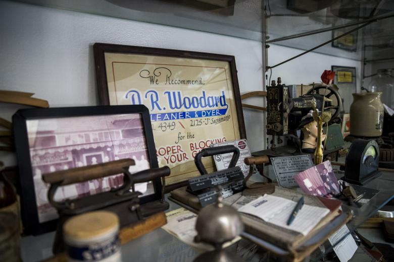 “I’m in my own little world” she says, of being tucked away in the back of the large warehouse. Phillips also helps in the front, where she sometimes interacts with customers who have been bringing their clothes to the business for three decades.