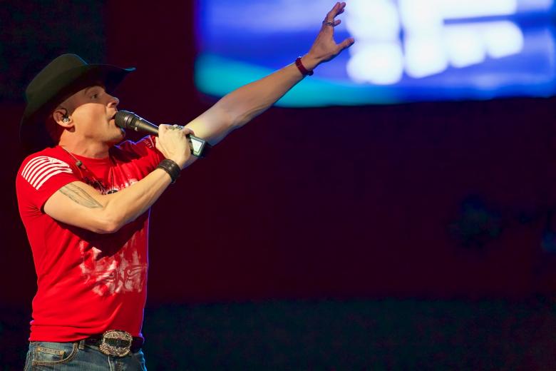 Country singer Ryan Weaver, a former Black Hawk helicopter pilot, performs one of several songs on Jan. 27, such as “Never Forgotten,” written in memory of his brother Aaron who was killed in Iraq.