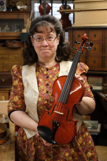 In 1999, Macomber began apprenticing for Master Violin Maker Albert Muller. She had been bringing her bows to his shop off El Camino Avenue for repairs until one day he gave her a book on the craft and asked if she would like to make a violin. “I was hooked, and I quit everything else,” she says. Macomber took over the shop in 2006 and has since made 45 violins, seven cellos, seven harps and five violas.