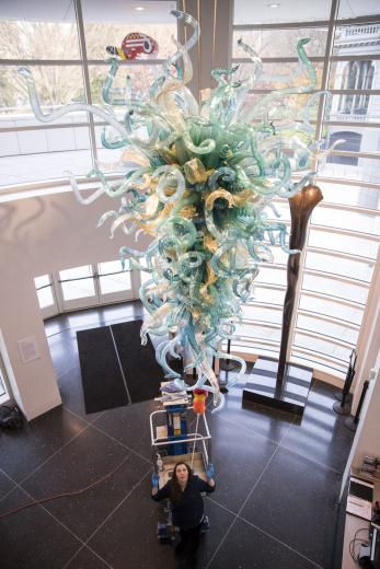 It’s important to always keep the artwork looking good: Dale Chihuly’s 2014 blown-glass sculpture is translucent, with colors representing Sacramento’s rivers and mining history.