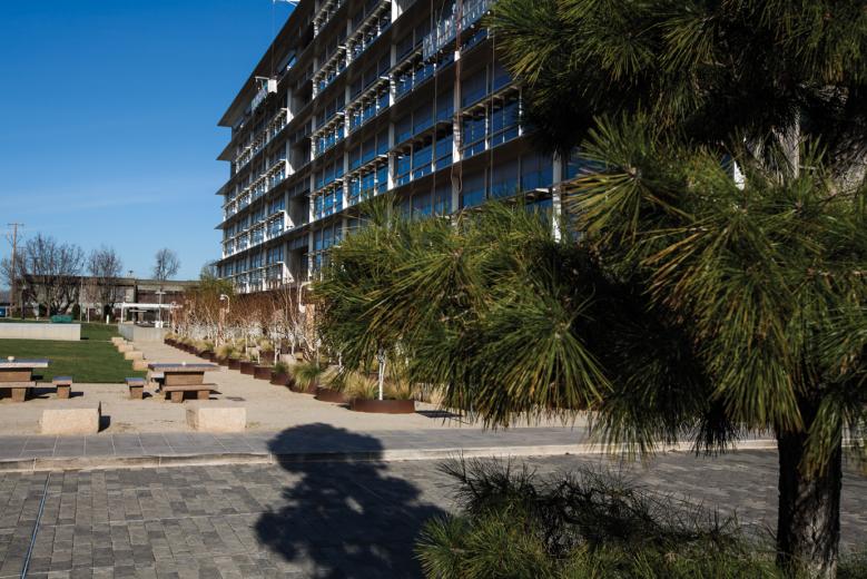 The headquarters complex uses massive glass atriums to bring in natural light and incorporates greenery inside and out. Synthetic bamboo and a meditation garden in the property’s interior complement the building’s bamboo flooring and walls. The headquarters complex uses massive glass atriums to bring in natural light and incorporates greenery inside and out. Synthetic bamboo and a meditation garden in the property’s interior complement the building’s bamboo flooring and walls.