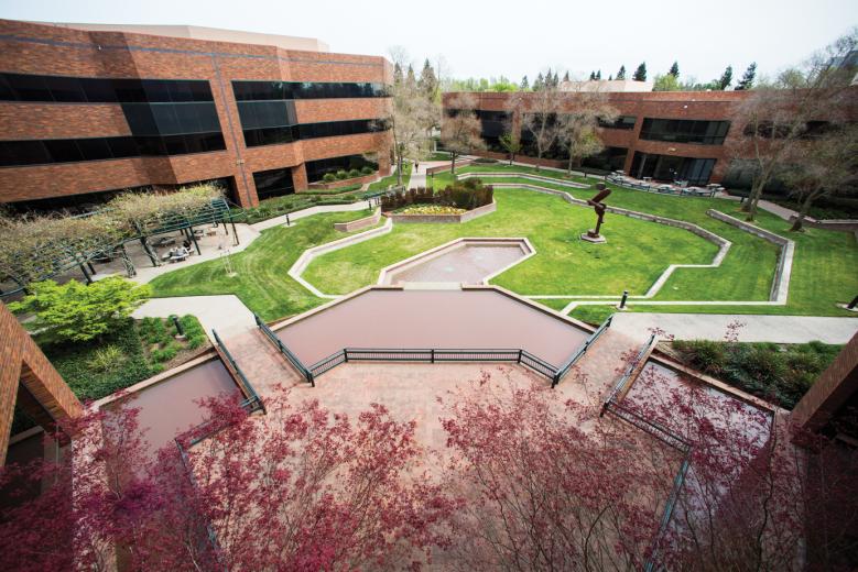 Walking paths, outdoor seating, water features and a sprawling lawn in the property’s courtyard give Metro Center a tucked-away, park-like feel in South Natomas. Walking paths, outdoor seating, water features and a sprawling lawn in the property’s courtyard give Metro Center a tucked-away, park-like feel in South Natomas.