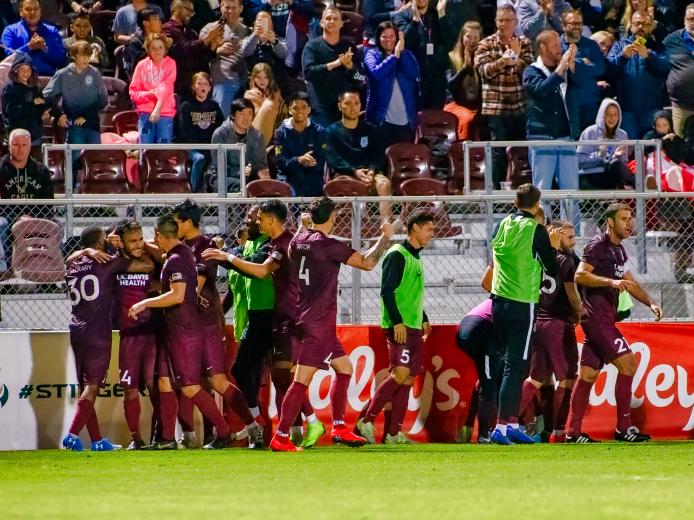 Jaime Villarreal is mobbed by his Sacramento teammates before a sold-out crowd of 11,569 after his late goal beat Austin Bold FC 1-0 at Papa Murphy’s Park on April 6.
