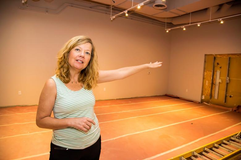 Kate Chomko, owner of Downtown & Vine, plans to double space for special events, putting “Democrats on one side and Republicans on the other” of the double doors connecting her two spaces. Kate Chomko, owner of Downtown & Vine, plans to double space for special events, putting “Democrats on one side and Republicans on the other” of the double doors connecting her two spaces.