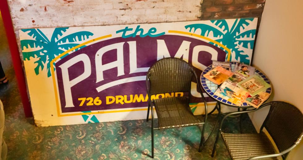 The Palms Playhouse sign from the original south Davis barn from late 1970s-2002 now resides at the bottom of the stairs leading to the old Winters Opera House and the Palms’ current location.