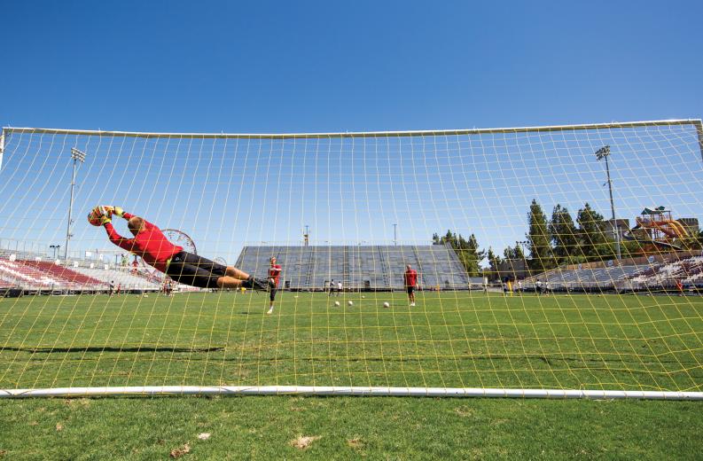 Dominik Jakubek, one of two goalkeepers for Sacramento Republic FC, makes a diving save on a shot during practice at Bonney Field. Jakubek joined the franchise as an original member in 2014. He was 34 years old when he was signed. 