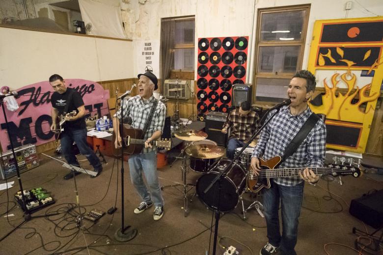 The bandmates practice and record as their schedules allow — the men also have families and jobs.