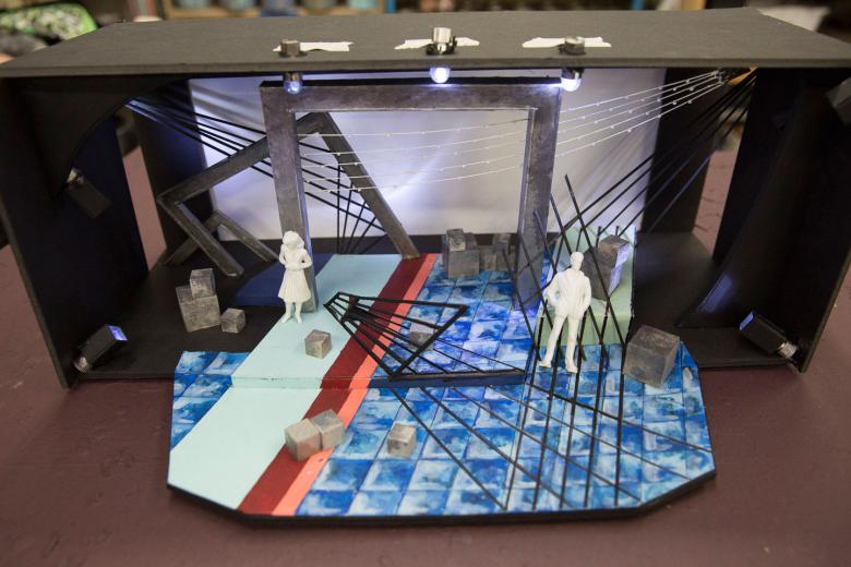 After conducting an extensive research period on the play she will be creating a set for, Reno creates a mini model of her design plan. After conducting an extensive research period on the play she will be creating a set for, Reno creates a mini model of her design plan.