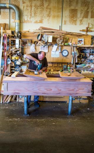 Donald Pettigrew assembles a casket made of redwood at Pettigrew & Sons Casket Co., which has been in the same warehouse on Power Inn Road in Sacramento for more than 50 years in a space that has grown to 25,000 square feet. Founder Fay Pettigrew (who is deceased) started Sutter Casket Co. in 1940 with friends. He eventually launched his own business; the company now includes five family members and three other employees (Donald is the youngest son of Fay and wife, Althea). Donald Pettigrew assembles a casket made of redwood at Pettigrew & Sons Casket Co., which has been in the same warehouse on Power Inn Road in Sacramento for more than 50 years in a space that has grown to 25,000 square feet. Founder Fay Pettigrew (who is deceased) started Sutter Casket Co. in 1940 with friends. He eventually launched his own business; the company now includes five family members and three other employees (Donald is the youngest son of Fay and wife, Althea).