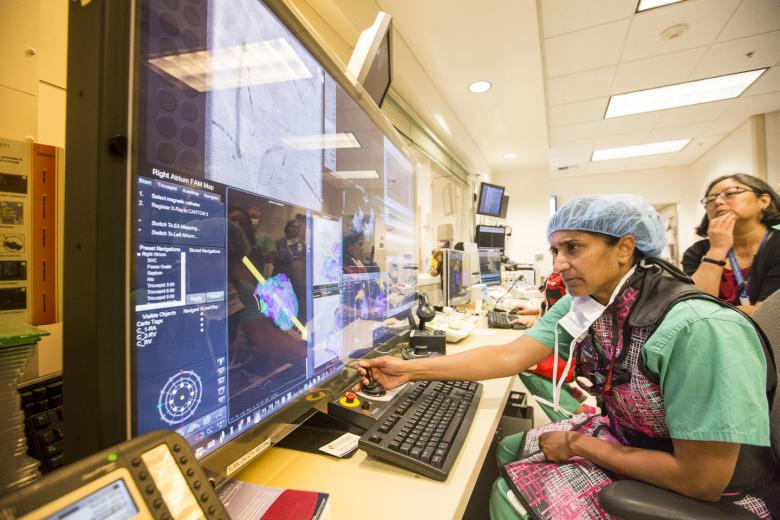 Here, Dr. Uma Srivatsa, associate professor of cardiovascular medicine for UCDMC, performs catheter manipulation and mapping inside the patient's heart and vascular system — from an entirely separate room — with the use of a computer-operated joystick.This allows her to visualize how electricity travels through the heart and, in most cases, provide treatment. Here, Dr. Uma Srivatsa, associate professor of cardiovascular medicine for UCDMC, performs catheter manipulation and mapping inside the patient's heart and vascular system — from an entirely separate room — with the use of a computer-operated joystick.This allows her to visualize how electricity travels through the heart and, in most cases, provide treatment.