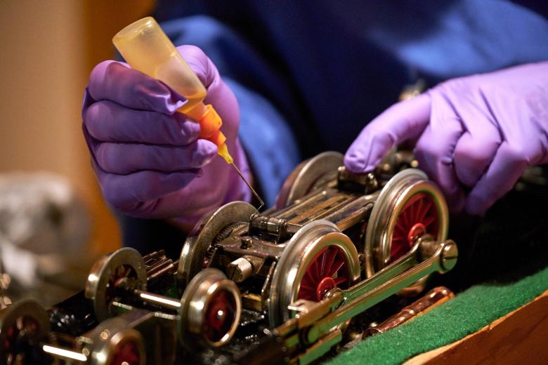 “The story is that it originally came from a gentleman who was a U.S. soldier in World War II stationed in France and went to Göppingen, Germany to the Märklin toy train factory,” Tran says. “He purchased this set with a Hershey's chocolate bar and a box of Lucky Strike cigarettes and brought it home for a birth gift for his son.”