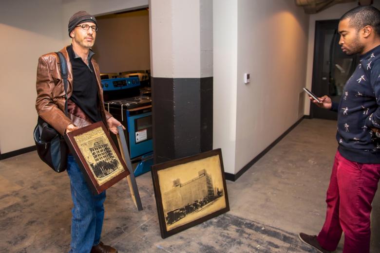 Historian and artist Chris Lango uses vintage newspaper clippings on the Lawrence Warehouse and Sacramento art community for his work Historian and artist Chris Lango uses vintage newspaper clippings on the Lawrence Warehouse and Sacramento art community for his work