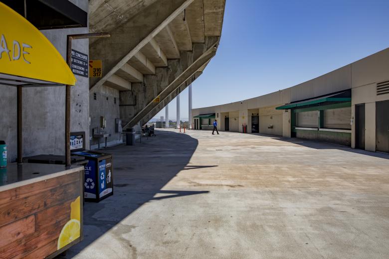 Though a few fans were sitting in the upper deck of the Coliseum, concession stands were closed.