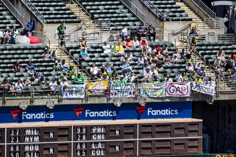 Fans in the right field bleachers expressed their dissatisfaction with the planned move during the June 29 game.