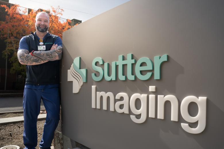 Pictured: Michael Mills, Radiologic Technologist, advancing his career through the new Gurnick upskilling program in CT