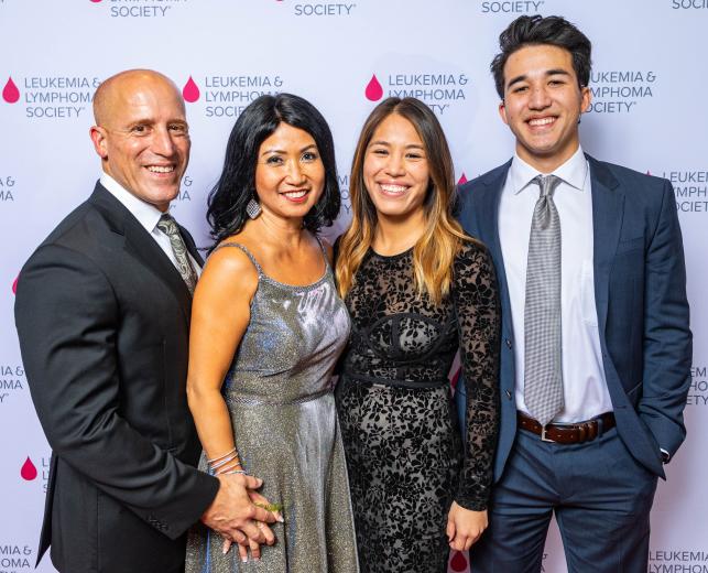 Gerry Villamil, managing director and president, Promethean Analytics; Lisa Villamil, Woman of the Year 2019; and children Katalina and Justino