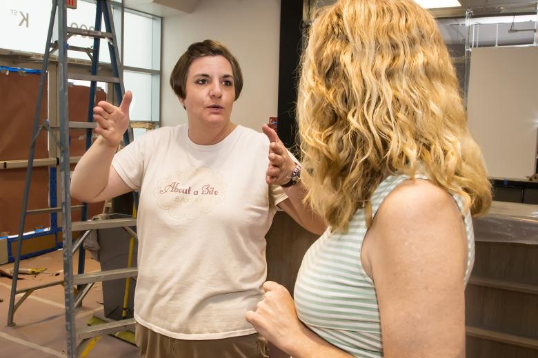 Jennifer Kaye (left), owner of About a Bite Bakery, talks with business partner Kate Chomko, owner of Downtown & Vine, about the build-out of their new space at 1200 K Street. Jennifer Kaye (left), owner of About a Bite Bakery, talks with business partner Kate Chomko, owner of Downtown & Vine, about the build-out of their new space at 1200 K Street.
