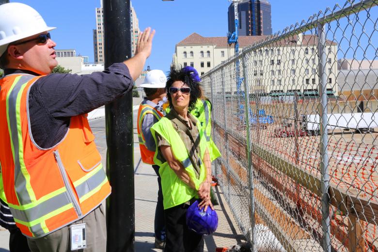 Artist Gale Hart listens to an arena briefing by Matt Sites, who works with urban planning for the City of Sacramento. Artist Gale Hart listens to an arena briefing by Matt Sites, who works with urban planning for the City of Sacramento.