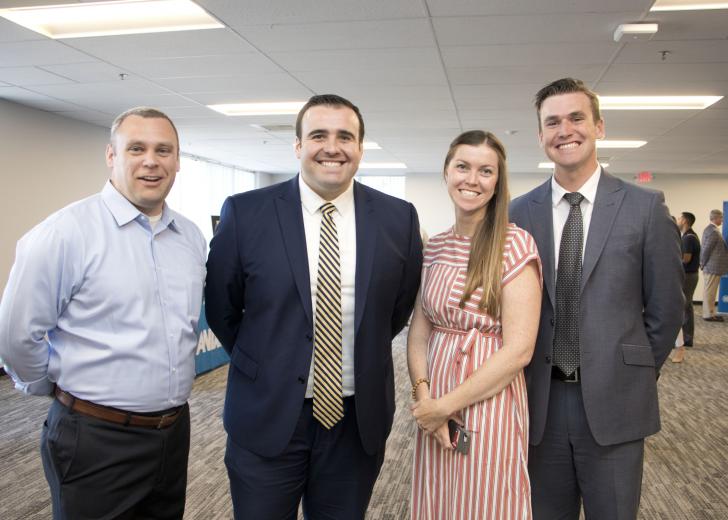 Steve Chilimidos, centralized security manager, Anixter; Parker Jolly, sales manager, Insight Global; and Alison Schwinger, human resources director, Anixter; and Aidan Kearney, account manager, Insight Global