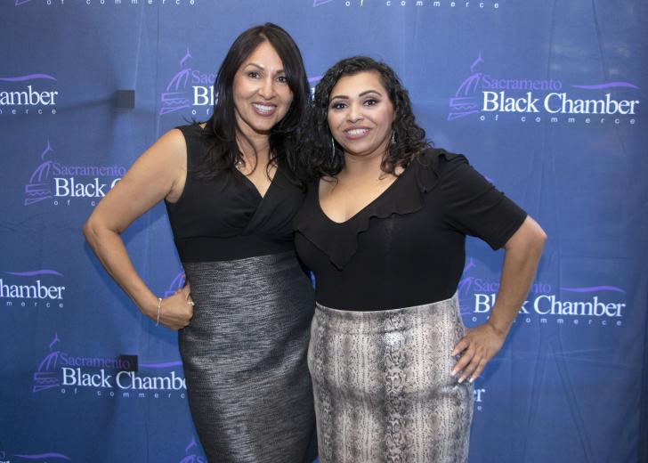 From Tri Counties Bank: Laurie Wright, business development manager; Malali Ghafari, branch manager