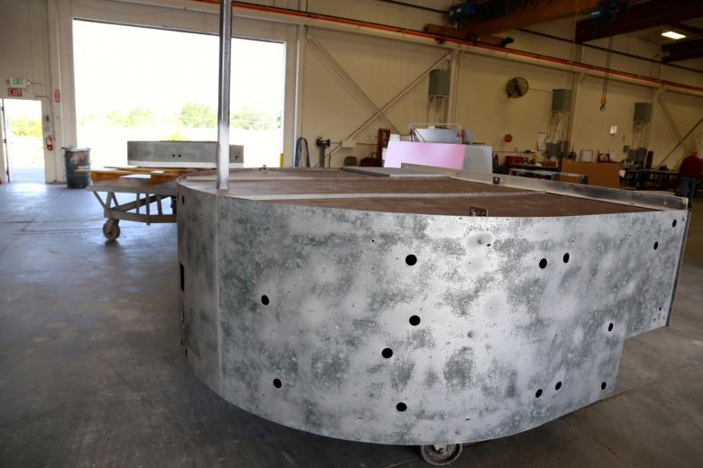 The canopy was stripped to bare metal, revealing holes that rust spots that would be filled before new paint could be applied. The canopy was stripped to bare metal, revealing holes that rust spots that would be filled before new paint could be applied.