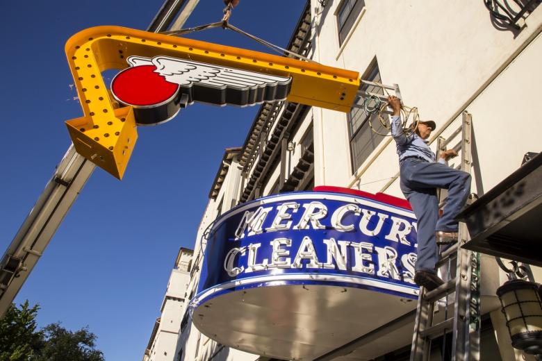 On the second day, the flashing yellow arrow was lifted into place, with a new support structure to attach it to the metal canopy. On the second day, the flashing yellow arrow was lifted into place, with a new support structure to attach it to the metal canopy.