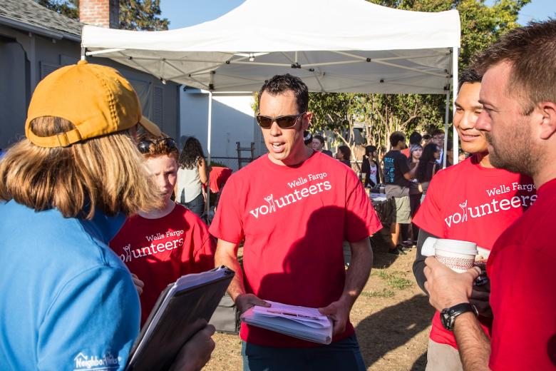 Pedar Bruce (center) and the Wells Fargo volunteer team check in with Sharon Eghigian (left), community impact manager for NeighborWorks HomeOwnership Center Sacramento Region, sponsor of the 26th annual Paint the Town event in South Oak Park on Saturday, Sept. 19, 2015.
Pedar Bruce (center) and the Wells Fargo volunteer team check in with Sharon Eghigian (left), community impact manager for NeighborWorks HomeOwnership Center Sacramento Region, sponsor of the 26th annual Paint the Town event in South Oak Park on Saturday, Sept. 19, 2015.
