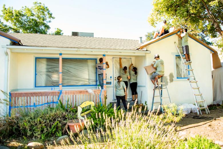 Sac State volunteers prep the Howe home on Orinda Way during the daylong Paint the Town event. Sac State volunteers prep the Howe home on Orinda Way during the daylong Paint the Town event.