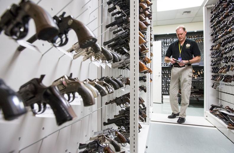 In order to determine the kind of gun from which a bullet has been fired, Criminalist Bruce Moran will compare a crime-scene bullet to a bullet shot from one of the lab’s own firearms. In order to determine the kind of gun from which a bullet has been fired, Criminalist Bruce Moran will compare a crime-scene bullet to a bullet shot from one of the lab’s own firearms.