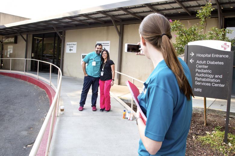 Stephanie Breitbart (right) takes a photo of fellow employees Jasnel Singh and Muey Saephan at Sutter Memorial Hospital, which remained fully staffed on Saturday, August 8, 2015, as patients were transferred to the new Sutter Medical Center in midtown Sacramento.  Stephanie Breitbart (right) takes a photo of fellow employees Jasnel Singh and Muey Saephan at Sutter Memorial Hospital, which remained fully staffed on Saturday, August 8, 2015, as patients were transferred to the new Sutter Medical Center in midtown Sacramento.