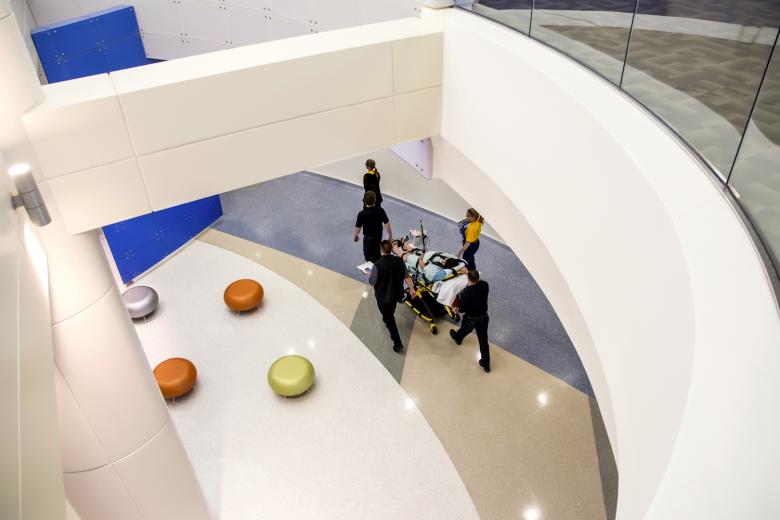 A high-risk maternity patient is taken through the lobby of the new Anderson Lucchetti Women's and Children's Center at Sutter Medical Center, Sacramento. All patients were transported by ambulance, with a registered nurse attending, as Sutter Memorial Hospital ceased operations on Saturday, August 8, 2015.  A high-risk maternity patient is taken through the lobby of the new Anderson Lucchetti Women's and Children's Center at Sutter Medical Center, Sacramento. All patients were transported by ambulance, with a registered nurse attending, as Sutter Memorial Hospital ceased operations on Saturday, August 8, 2015.