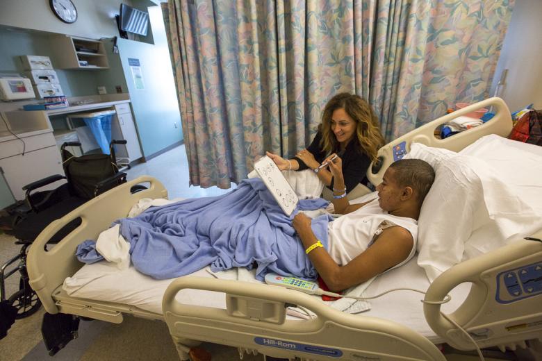 Castles teaches bedside at UC Davis Children’s Hospital in Sacramento. Formerly a second-grade teacher, Castles has been the only teacher at the children’s hospital for the past 15 years. With patients like Maurice, who was diagnosed with a brain tumor in August that has compromised his speech and motor skills, she works closely with the hospital’s occupational and physical therapists. Castles teaches bedside at UC Davis Children’s Hospital in Sacramento. Formerly a second-grade teacher, Castles has been the only teacher at the children’s hospital for the past 15 years. With patients like Maurice, who was diagnosed with a brain tumor in August that has compromised his speech and motor skills, she works closely with the hospital’s occupational and physical therapists.