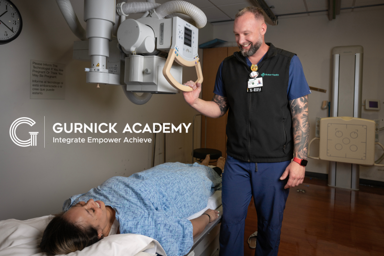 Pictured: Michael providing patient care while advancing his skills through Gurnick Academy’s upskilling program in collaboration with Sutter Health