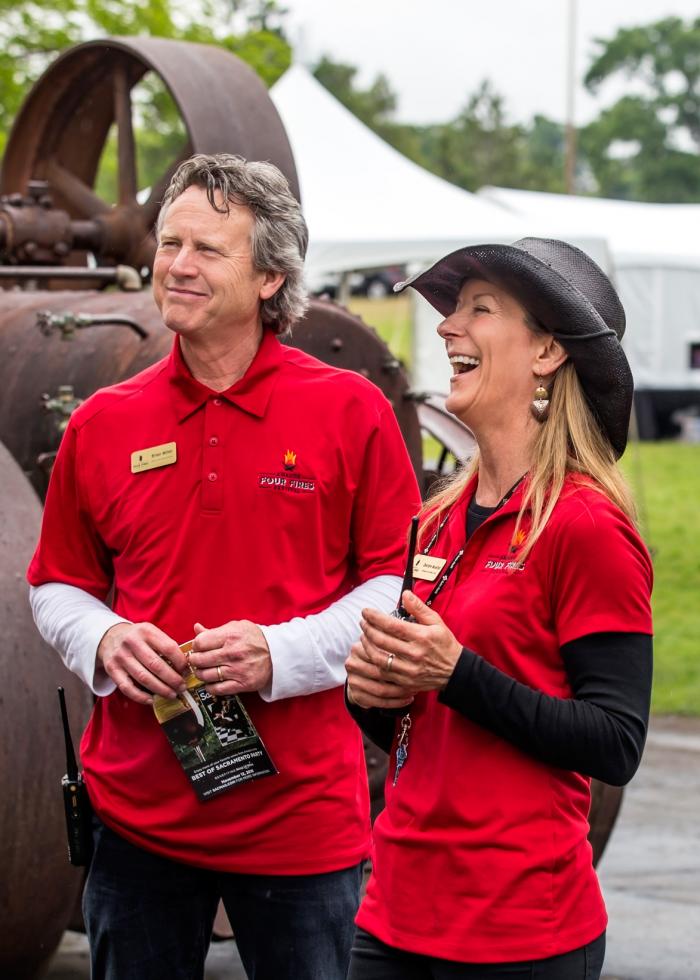 Brian Miller and Deidre Mueller, who also own Amador360 and run the Barbera Festival, take a break from managing the sold-out, second annual Amador Four Fires Festival.