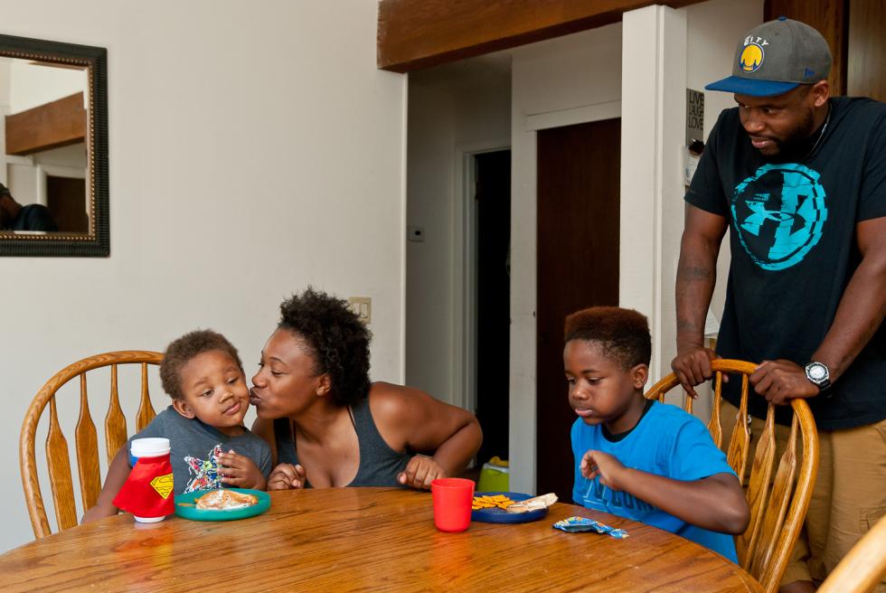 From left: Travis, Dejauna, Kavon and Steven Hayes in their Sacramento home.
