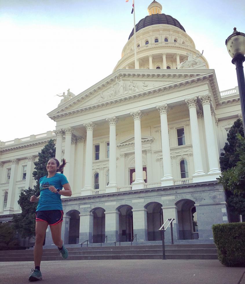 Jenn Kistler-McCoy goes for a run by the California State Capitol on a route she features in her new business, Sac Running Tours. (Photo courtesy Jenn Kistler-McCoy)