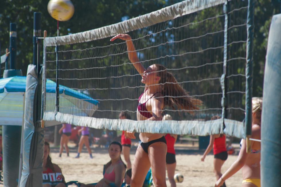 Kendall Kott plays in a beach volleyball tournament in  Sacramento. Kendall, 15, is an elite volleyball player and swimmer. (Photo by Cole Allen)