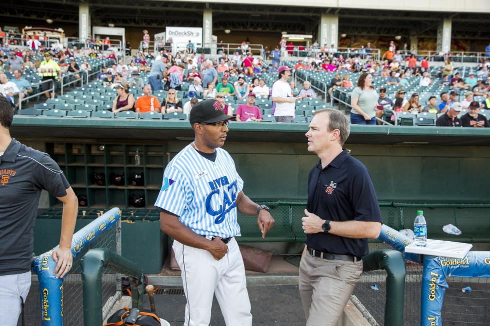  Left to Right Sacramento River Cats Manager Jose Alguacil chats with President Jeff Savage before the start of the game.
