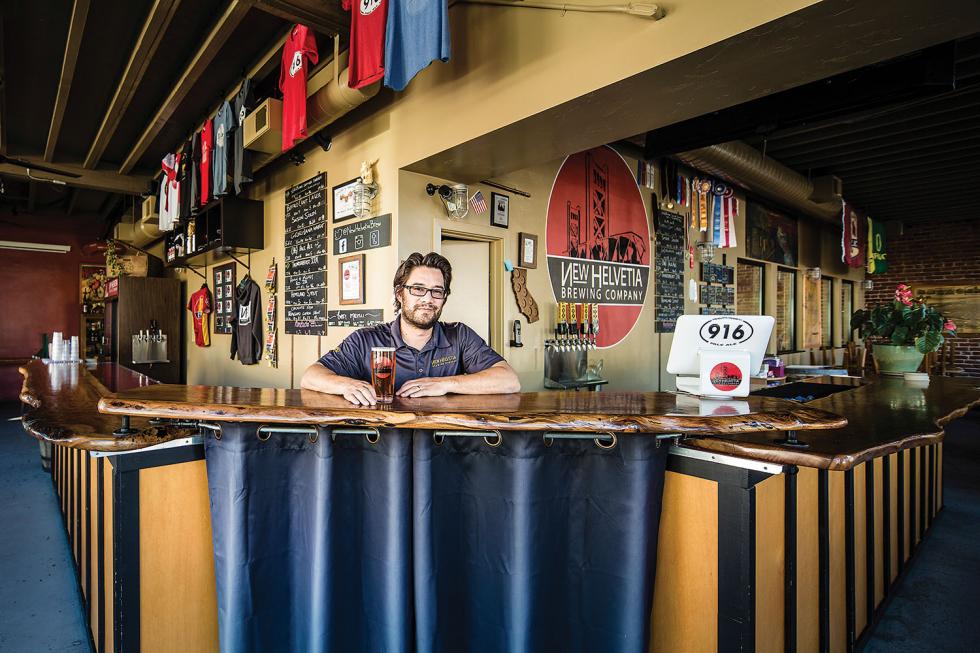 Dave Gull, vice president of New Helvetia Brewing Co., is ready for the afternoon rush at the Broadway tasting room. 