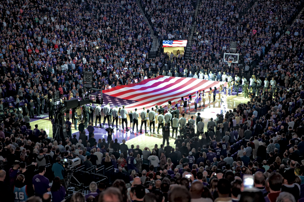 The Sacramento Kings and San Antonio Spurs line up for the National Anthem at Golden 1 Center before the arena’s first regular-season NBA game on Oct. 27, 2016.