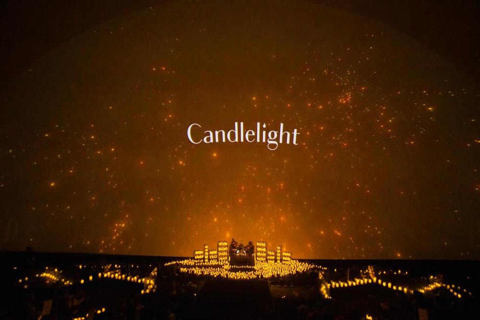 A Candlelight Concert takes place at The Fleet Science Center in San Diego. (Photo courtesy of Fever)