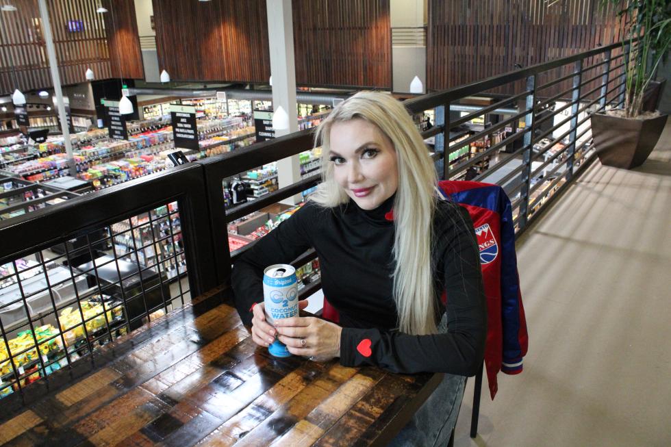 Bunny Stewart sits in the upper area of the Sacramento Natural Foods Co-op off R Street. Stewart initially became involved with the local film scene as a makeup artist before starting to take onscreen roles as well. (Photo by Jacob Peterson)