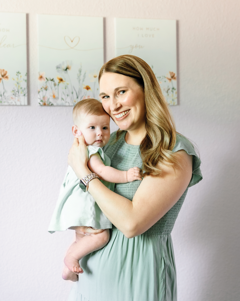 Allison Formoso holds her daughter Avery. Formoso says she found support through Mahmee both before and after Avery’s birth. (Photo by Melissa Strong)
