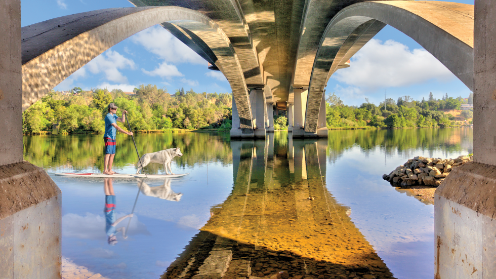 You can rent kayaks and paddleboards at Black Miners Bar and enjoy the views and cool waters of Lake Natoma. (Photo courtesy of Choose Folsom)